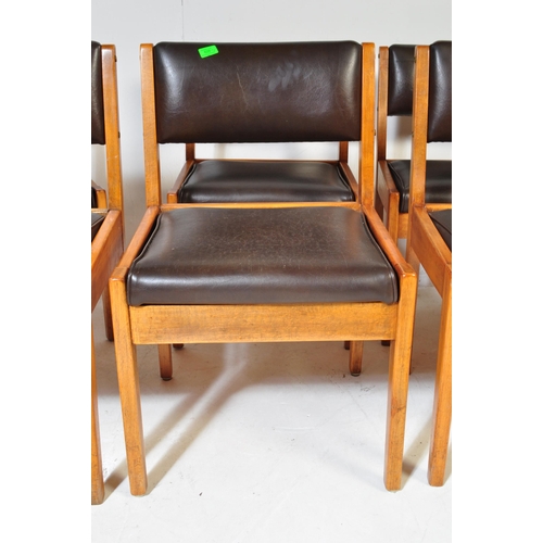 628 - A set of eight retro vintage mid 20th century black faux leather & teak frame dining chairs. Each ch... 