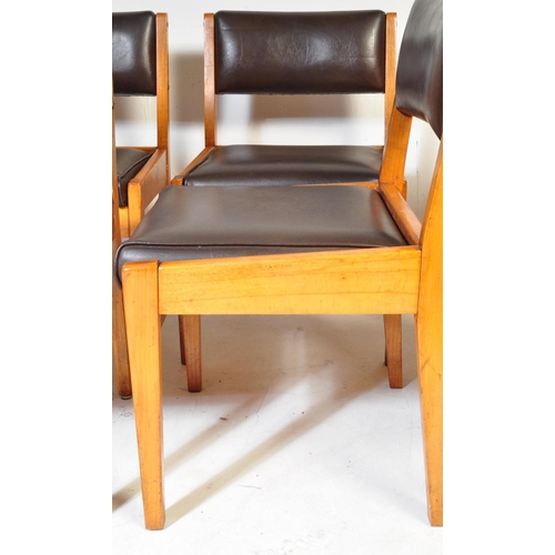 628 - A set of eight retro vintage mid 20th century black faux leather & teak frame dining chairs. Each ch... 