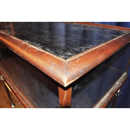 635 - A large 20th Century stained pine framed and glass paneled shop display cabinet / counter of large r... 