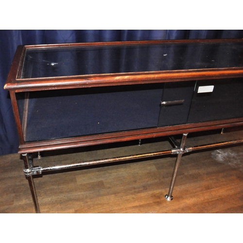 635 - A large 20th Century stained pine framed and glass paneled shop display cabinet / counter of large r... 