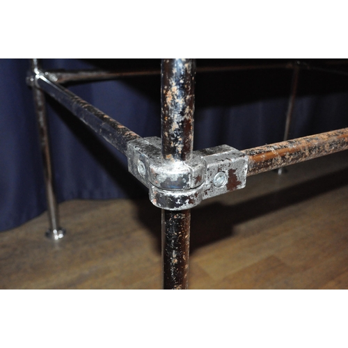 635 - A large 20th Century stained pine framed and glass paneled shop display cabinet / counter of large r... 