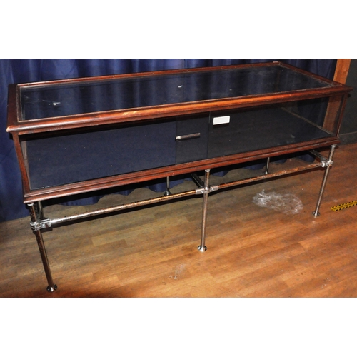 635 - A large 20th Century stained pine framed and glass paneled shop display cabinet / counter of large r... 