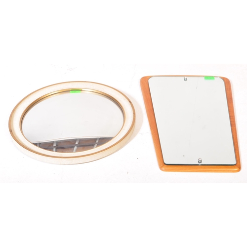 639 - Mid 20th Century teak wood atomic sputnik style wall mirror of ovoid shape together with a circa 195... 