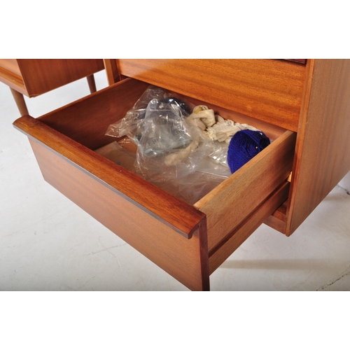 643 - Austinsuite - Mid-century teak wood dressing table being raised on splayed legs with suspended body ... 