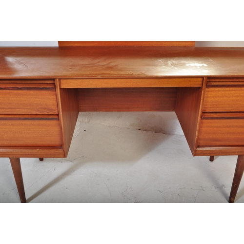 643 - Austinsuite - Mid-century teak wood dressing table being raised on splayed legs with suspended body ... 