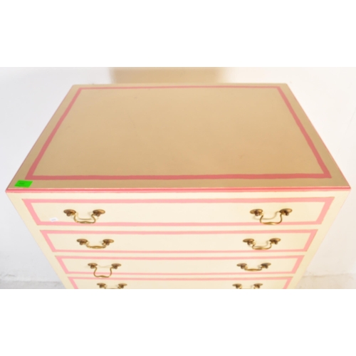 646 - A retro vintage 20th century wooden painted tall chest of drawers. The tallboy having a series of ni... 