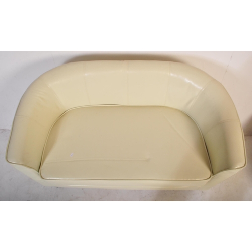 648 - A retro vintage 20th Century white faux leather stitched club / fireside lounge suite comprising of ... 