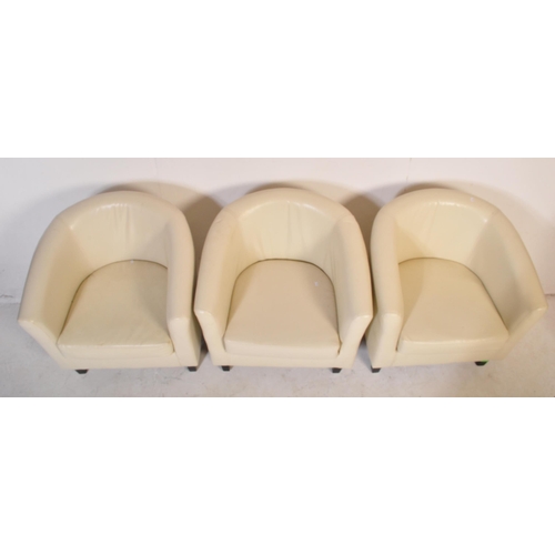 648 - A retro vintage 20th Century white faux leather stitched club / fireside lounge suite comprising of ... 