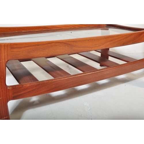 651 - A retro vintage 20th century G Plan teak wood nest of tables in the quadrille pattern along with a G... 