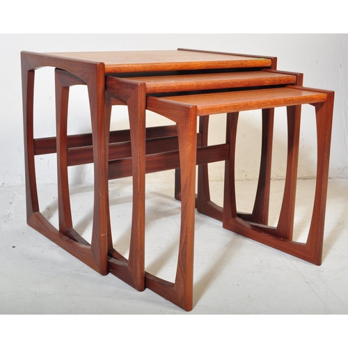 651 - A retro vintage 20th century G Plan teak wood nest of tables in the quadrille pattern along with a G... 
