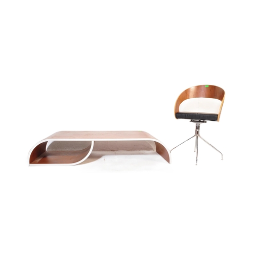 652 - A contemporary low bentwood coffee table / console table along with a bentwood desk chair raised on ... 