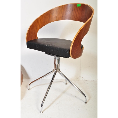 652 - A contemporary low bentwood coffee table / console table along with a bentwood desk chair raised on ... 