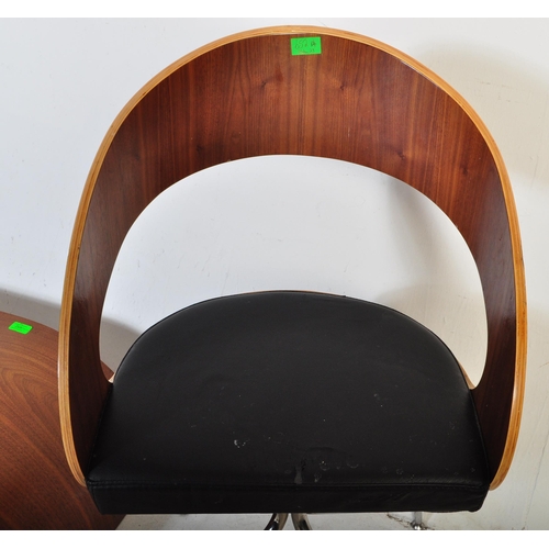 652 - A contemporary low bentwood coffee table / console table along with a bentwood desk chair raised on ... 