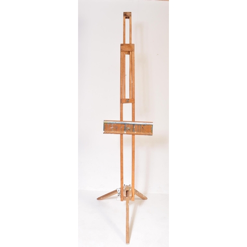 653 - A retro vintage 20th Century artist painting easel of large form / size by Daler. Oak construction a... 