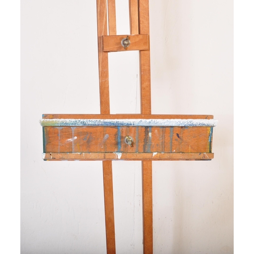 653 - A retro vintage 20th Century artist painting easel of large form / size by Daler. Oak construction a... 
