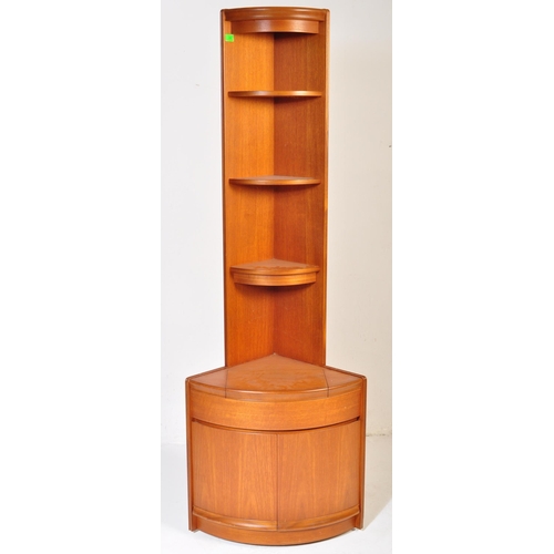 656 - William Lawrence - A retro mid 20th Century teak corner cabinet having a slender shelf top raised on... 