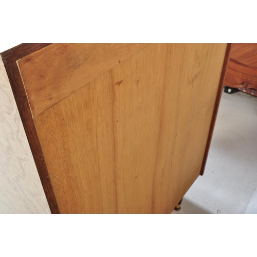 659 - A retro mid 20th Century pedestal Italian formica chest of drawers having a straight bank of six gra... 