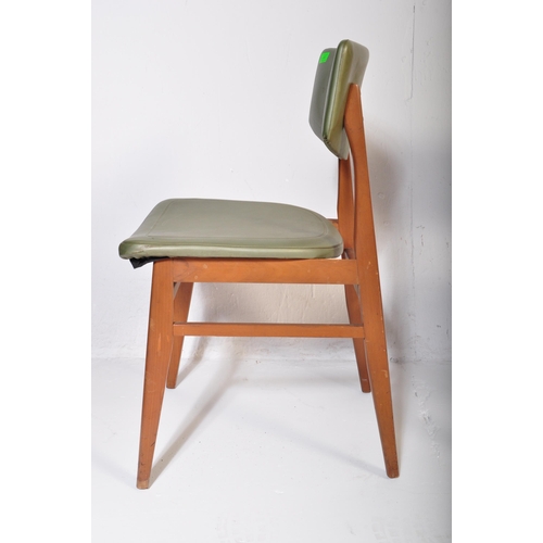 662 - A matching set of four retro mid 20th Century beech framed dining chairs each with faux green leathe... 