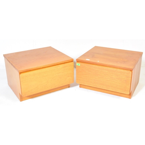 664 - A matching pair of retro teak bedside chests / nightstands with each of low form having single blind... 