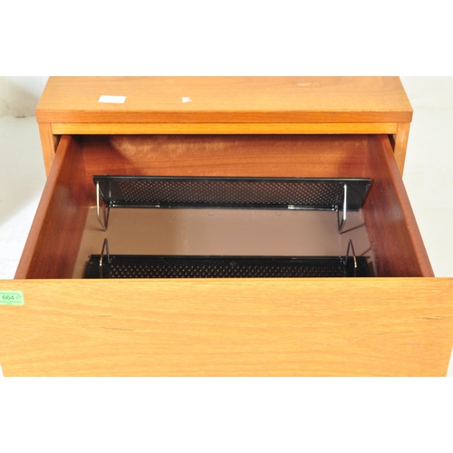 664 - A matching pair of retro teak bedside chests / nightstands with each of low form having single blind... 