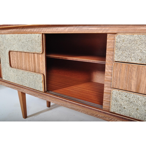 665 - A retro 20th Century two tone formica sideboard credenza having two cupboard doors to the left housi... 