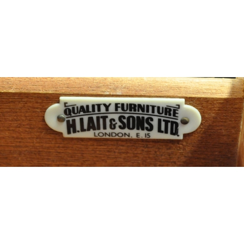 665 - A retro 20th Century two tone formica sideboard credenza having two cupboard doors to the left housi... 