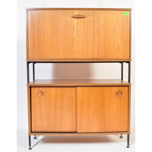 679 - British Modern Design - Mid-century Avalon modular unit in teak wood with fall front drink cabinet o... 