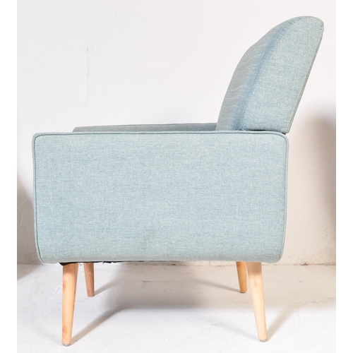 695 - Three contemporary light blue fabric padded back and seat rests lounge chairs raised on beech splaye... 