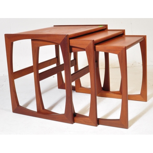 708 - G Plan - Quadrille pattern - A 1970's retro vintage teak wood graduating nest of tables. The three n... 
