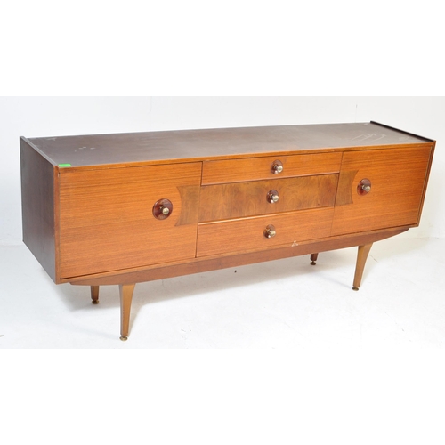 709 - A retro vintage 20th century circa 1970s Stone Hill sideboard. The sideboard having a central bank o... 