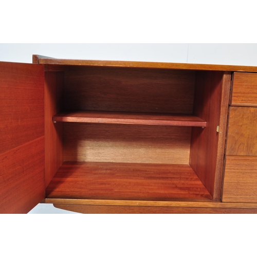 709 - A retro vintage 20th century circa 1970s Stone Hill sideboard. The sideboard having a central bank o... 