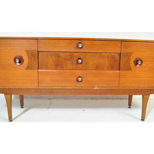 709 - A retro vintage 20th century circa 1970s Stone Hill sideboard. The sideboard having a central bank o... 