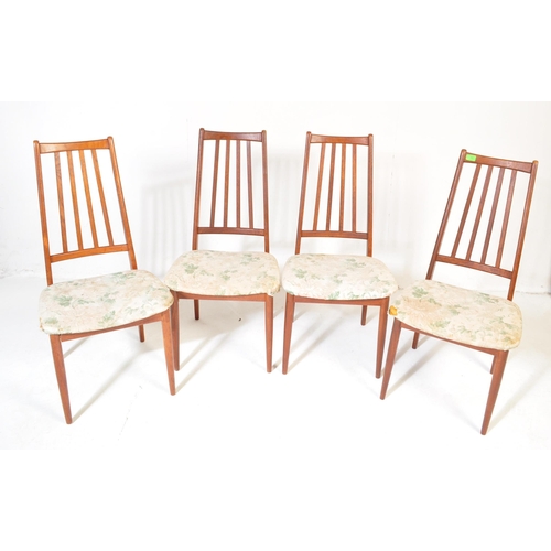 722 - A set of four retro vintage mid 20th century teak high rail back dining chairs of Danish influence i... 