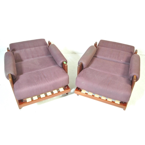730 - A pair of retro vintage 20th century circa 1970s oak framed armchairs day beds, with adjustable seat... 