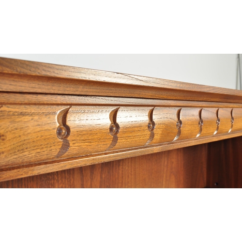 731 - Lucian Ercolani - Ercol - A retro vintage mid-century beech and elm golden dawn open front library b... 