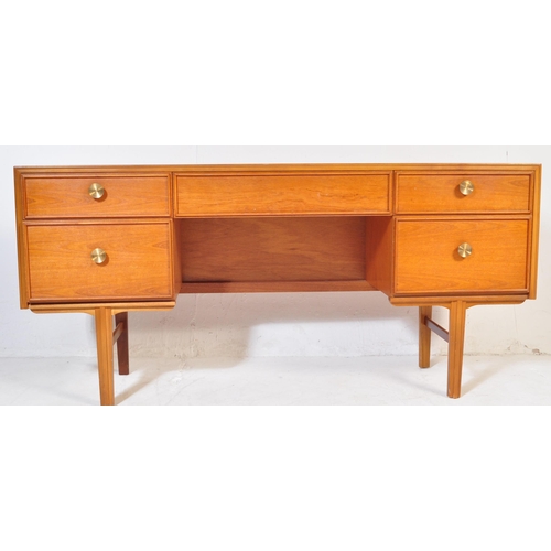 746 - A retro vintage mid 20th Century teak wood dressing table. Of rectangular form with single secret dr... 