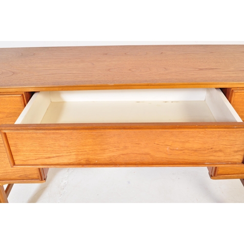 746 - A retro vintage mid 20th Century teak wood dressing table. Of rectangular form with single secret dr... 