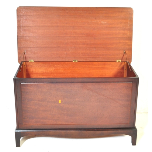 756 - Stag Minstrel - A 20th century Stag Minstrel mahogany blanket box having chamfered lift up top over ... 