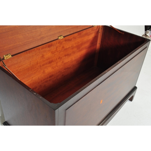 756 - Stag Minstrel - A 20th century Stag Minstrel mahogany blanket box having chamfered lift up top over ... 