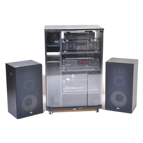 757 - A 20th century vintage audio hi-fi stacking stereo system. To include JVC FX-333L tuner, a Sony twin... 