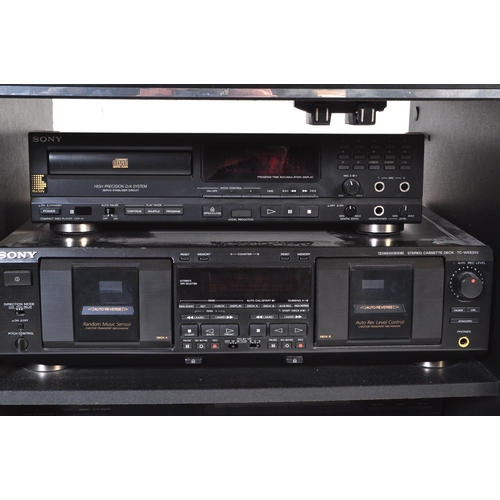 757 - A 20th century vintage audio hi-fi stacking stereo system. To include JVC FX-333L tuner, a Sony twin... 