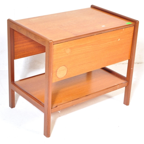 765 - A mid 20th Century retro vintage teak wood serving trolley. With twin drop leaves rectangular form w... 