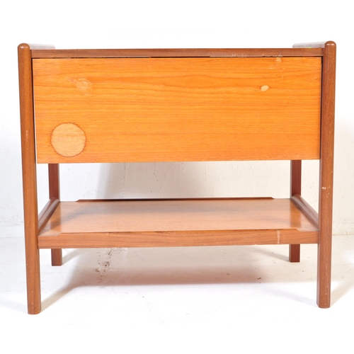 765 - A mid 20th Century retro vintage teak wood serving trolley. With twin drop leaves rectangular form w... 