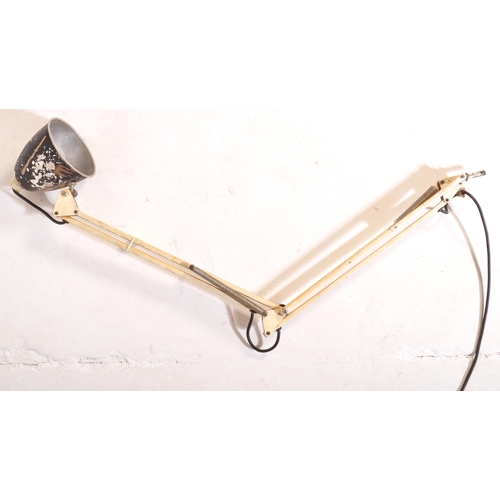 770 - A retro mid Century articulated twin arm desk lamp light having a aluminum pendant shade with sprung... 