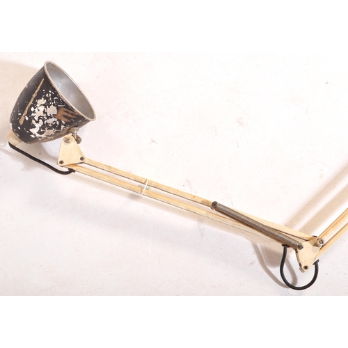 770 - A retro mid Century articulated twin arm desk lamp light having a aluminum pendant shade with sprung... 