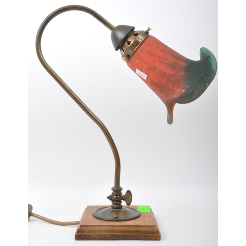 823 - An early 20th Century French Art Nouveau glass table lamp light. Having a brass metal arm with paint... 