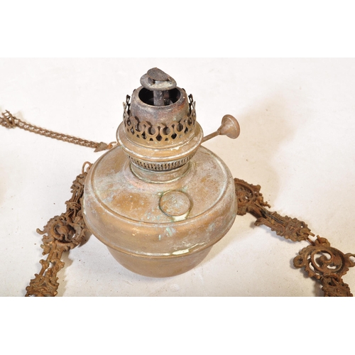 843 - An Edwardian early 20th century cast iron rise & fall oil ceiling lamp chandelier with foliate shape... 