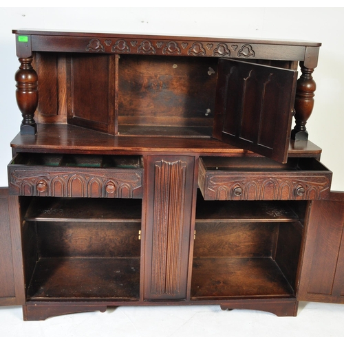 845 - A 20th century longcase grandfather clock. The clock having a gilded face ornate brass spandrels to ... 