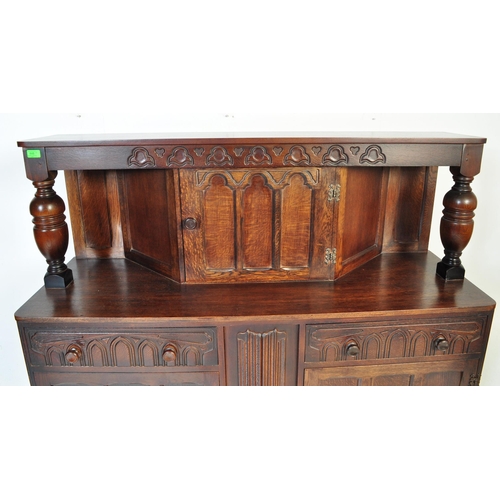 845 - A 20th century longcase grandfather clock. The clock having a gilded face ornate brass spandrels to ... 