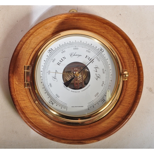 846 - A 20th century Kelvin Hughes brass & wood wall barometer. The lot together with a 20th century Accti... 